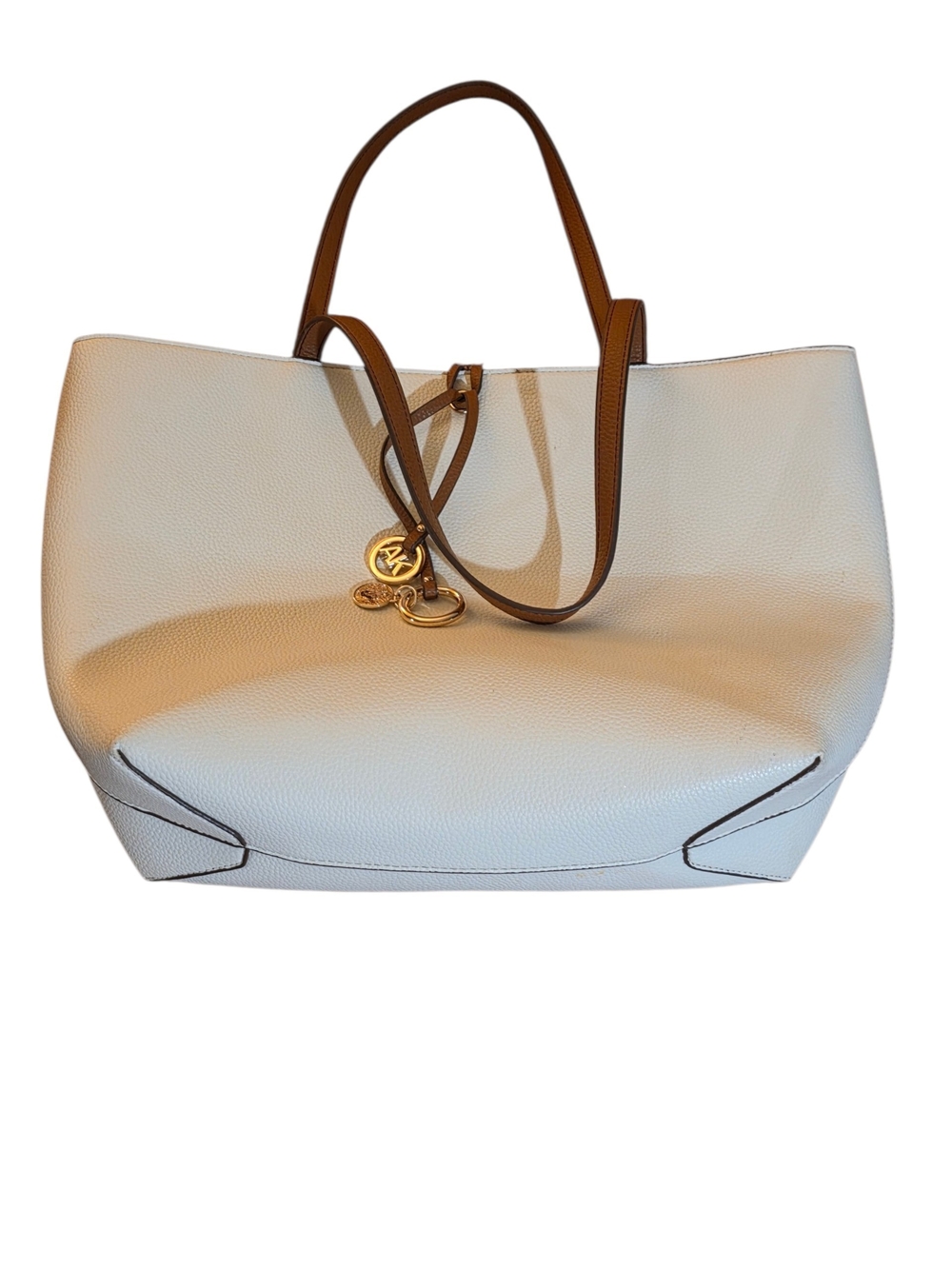 Anne Klein White Tote with Brown Straps and Gold Charm Has small flaw on bottom